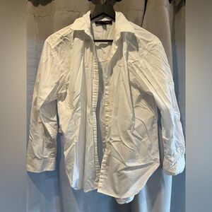 Plain white button up. Worn 1x for job interview size xs no stains.